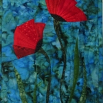 Two poppies on blue